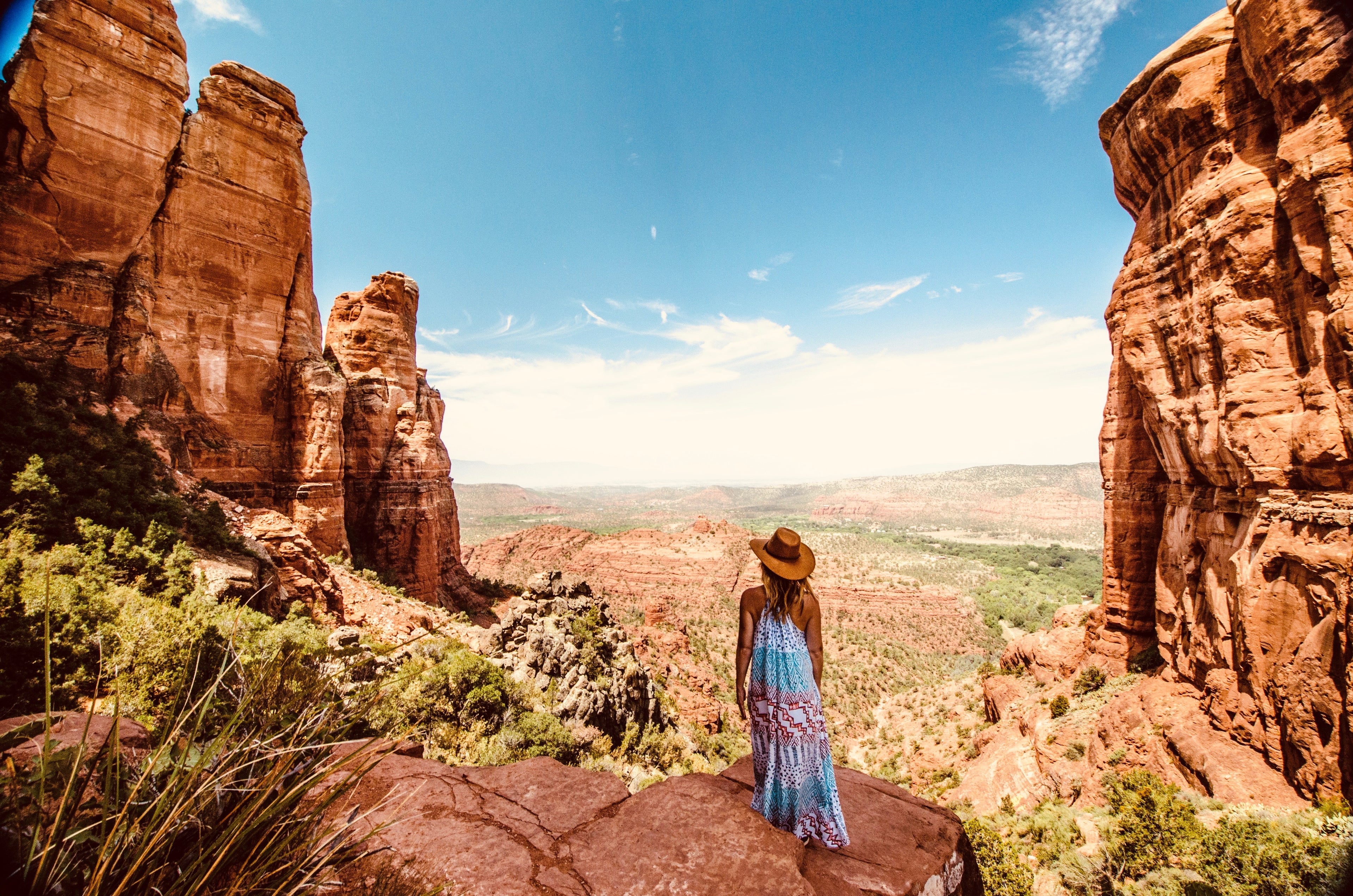 WOMAN-LOOKS-OUT-OVER-DESERT-VALLEY